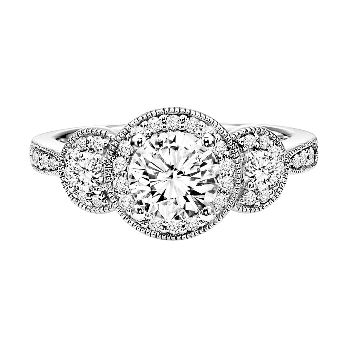 Fusing glamour and vintage flair, this 3-stone round diamond engagement ring features a prong set diamond halo and band with milgrain detailing