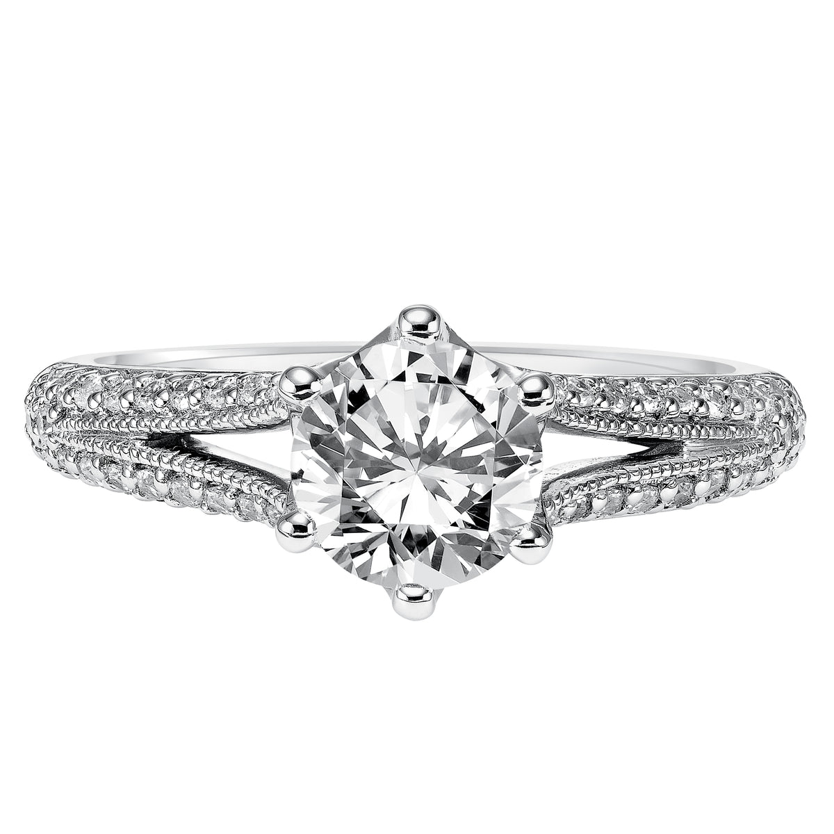 Delicate details infuse timeless elegance in this engagement ring featuring a round brilliant diamond set in a pave split band with milgrain