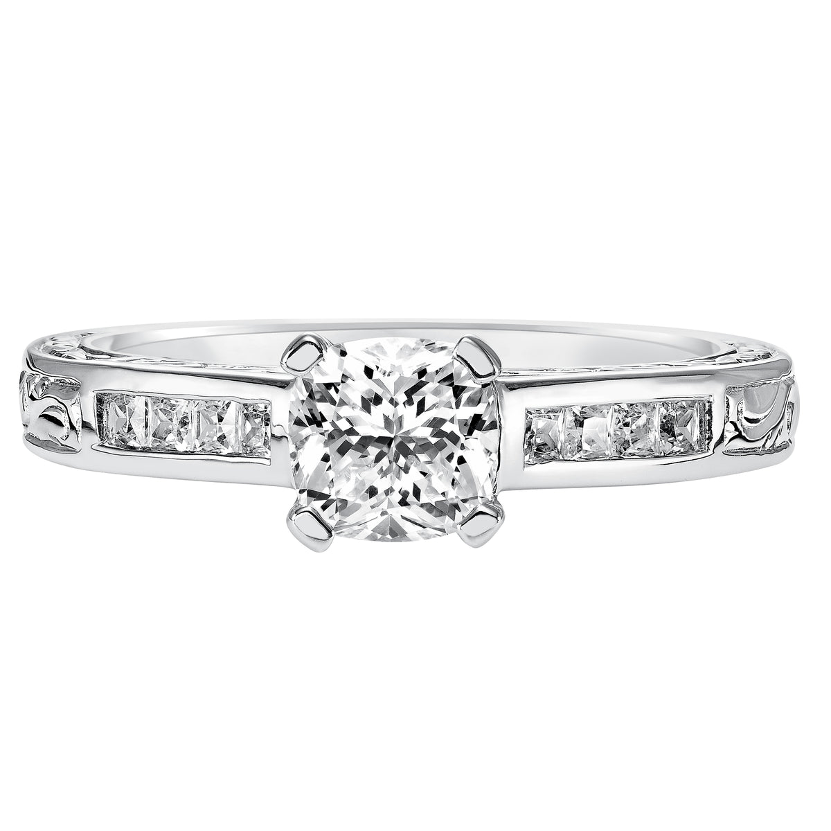 This gorgeous cushion cut diamond is accentuated by a sophisticated channel set diamond band, with delicate filigree and engraving