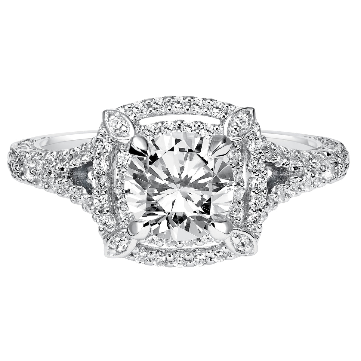 Magnificent from all angles, this show-stopping engagement ring features a prong set diamond double halo with delicate engraving and milgrain on the band