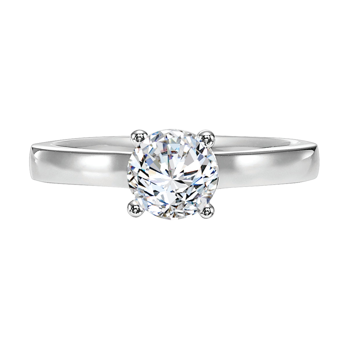 This alluring solitaire engagement ring features a 4-prong setting and beautiful surprise diamond