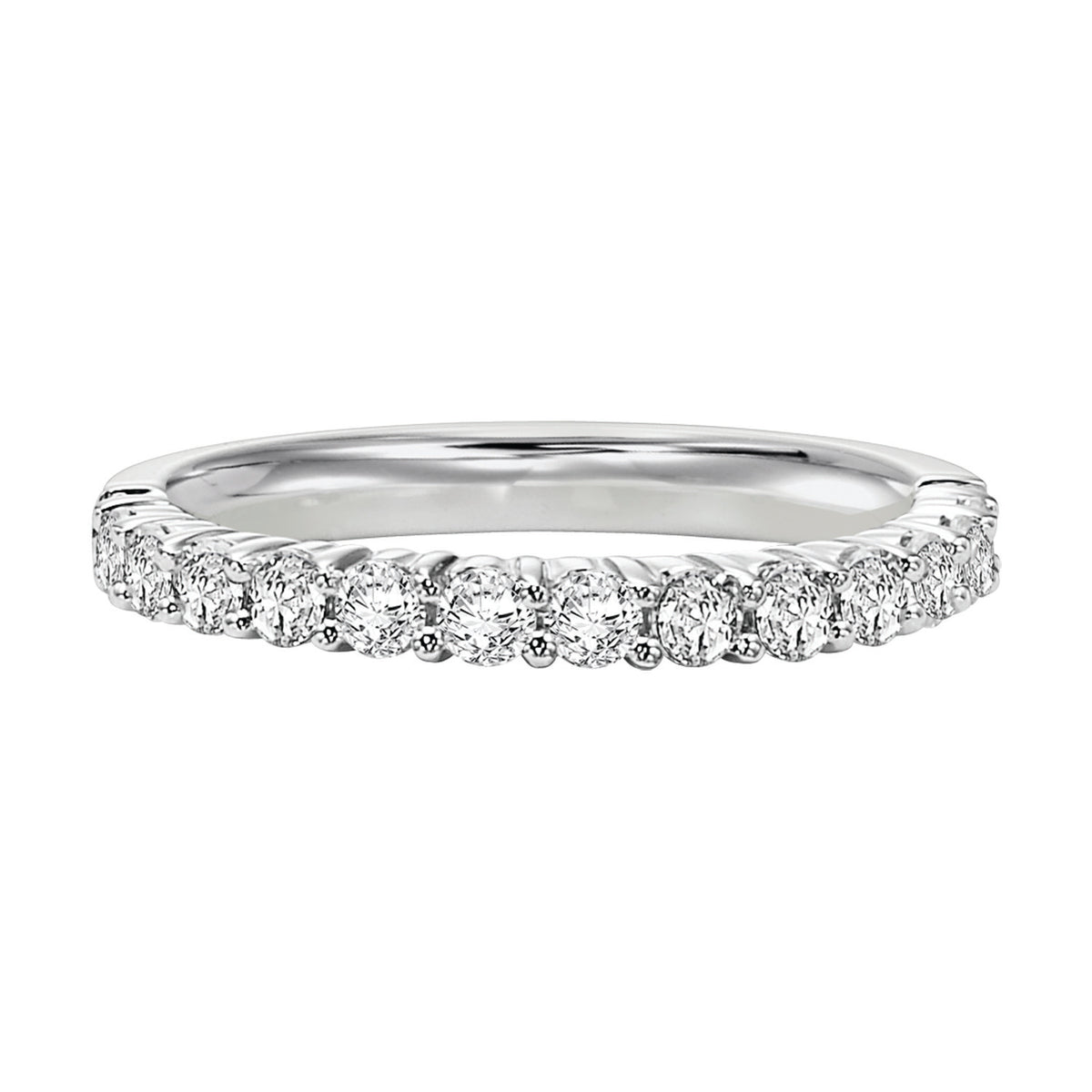 Wedding band with round, prong set diamonds halfway around.