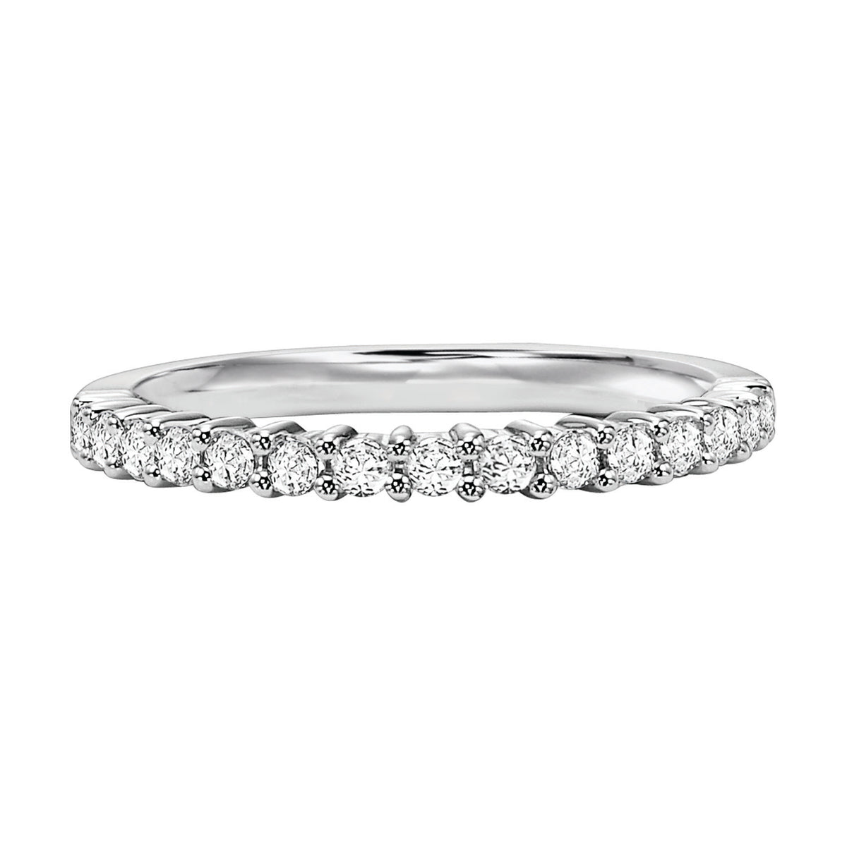 Wedding band with round, prong set diamonds halfway around.