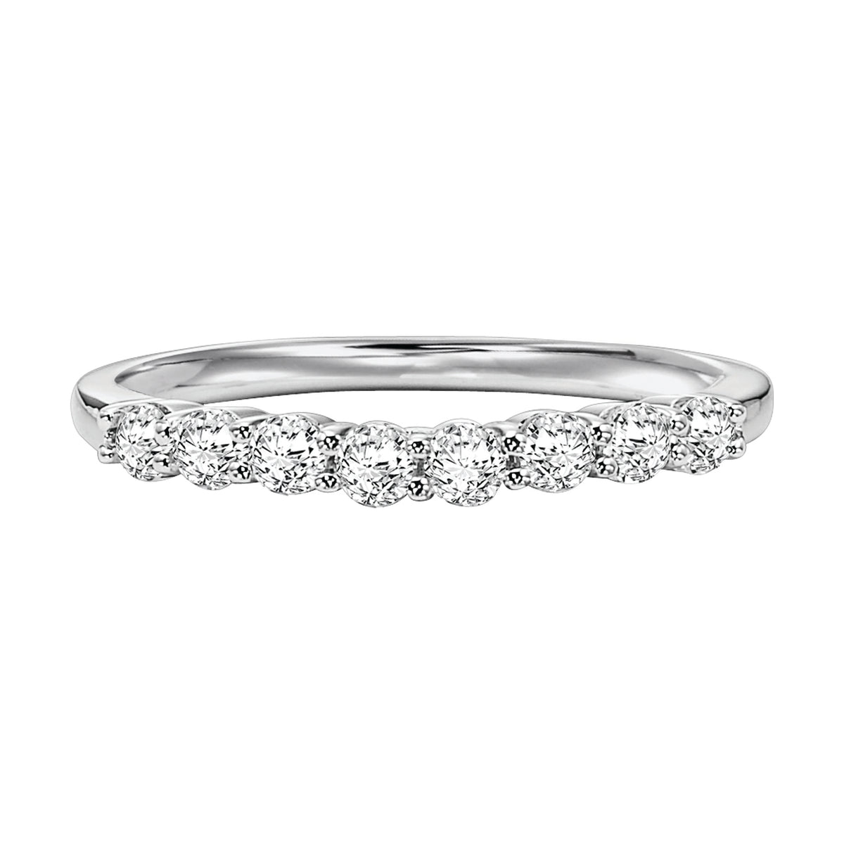 Wedding band with six, round, prong set diamonds and high polished shank.