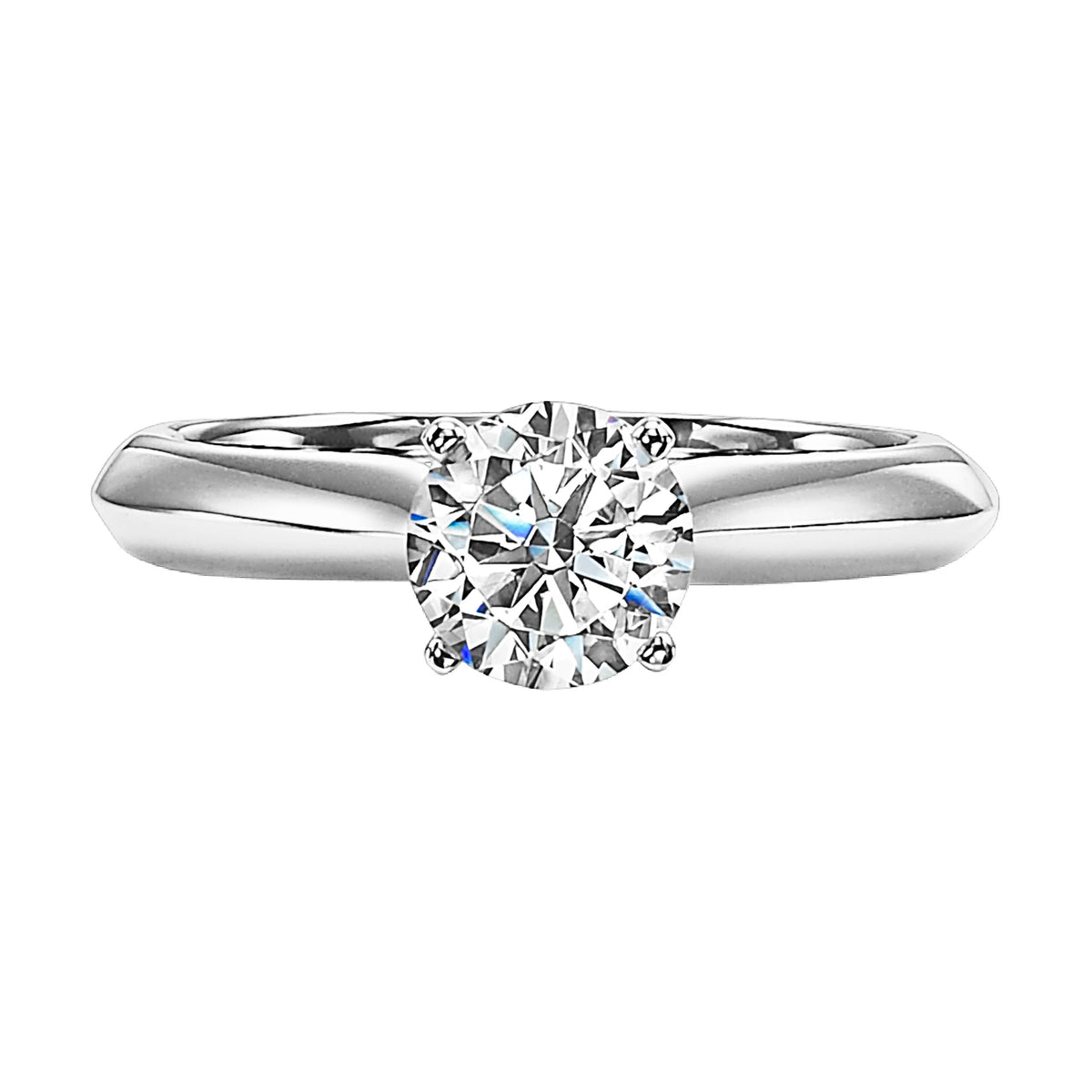 This brilliant round diamond is set with a classic high polished band creating the perfect balance of sophistication and elegance