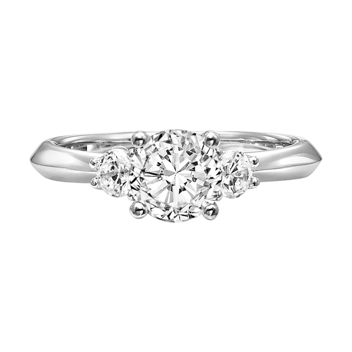 This classic 3-stone diamond engagement ring is set with a high polished band for a timeless look