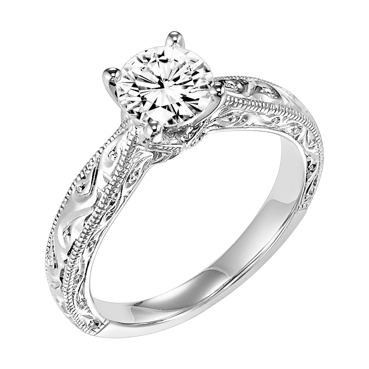 Delicate engraving graces the band set with this brilliant round diamond center stone for a gorgeous look