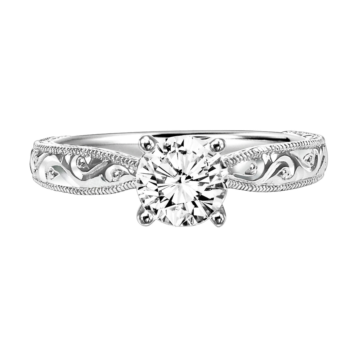 Delicate engraving graces the band set with this brilliant round diamond center stone for a gorgeous look