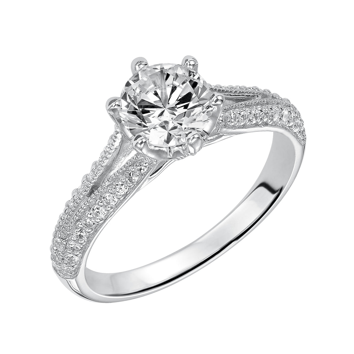 Delicate details infuse timeless elegance in this engagement ring featuring a round brilliant diamond set in a pave split band with milgrain