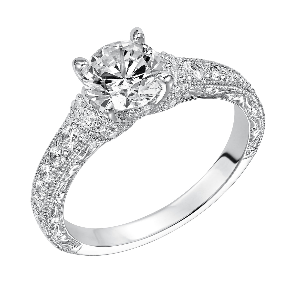 Intricately designed, this engagement ring is spectacular with its prong set diamond band, delicate engraving and milgrain
