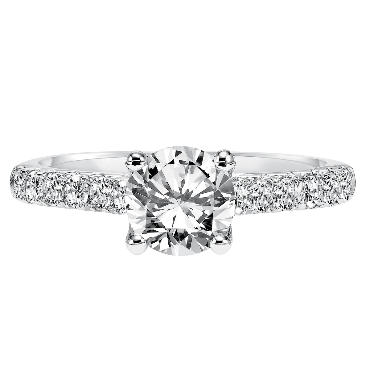 Prong set diamonds grace the band of this strikingly timeless round diamond engagement ring