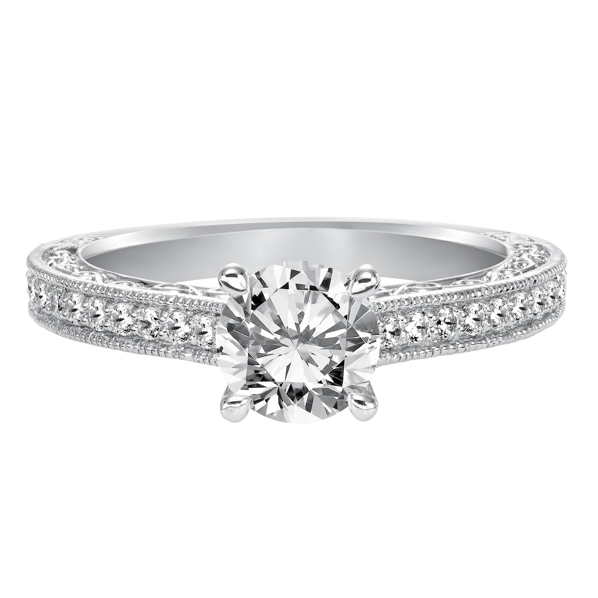 This round brilliant diamond is complimented by stunning diamond prong set and filigree band