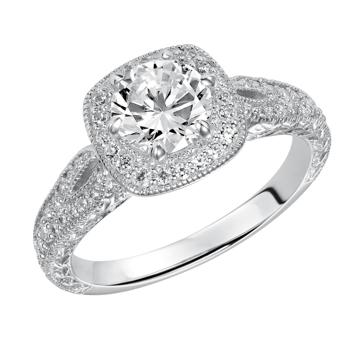 Modern meets vintage with this beloved engagement ring featuring a stunning prong set diamond halo and band with milgrain details and an engraved design