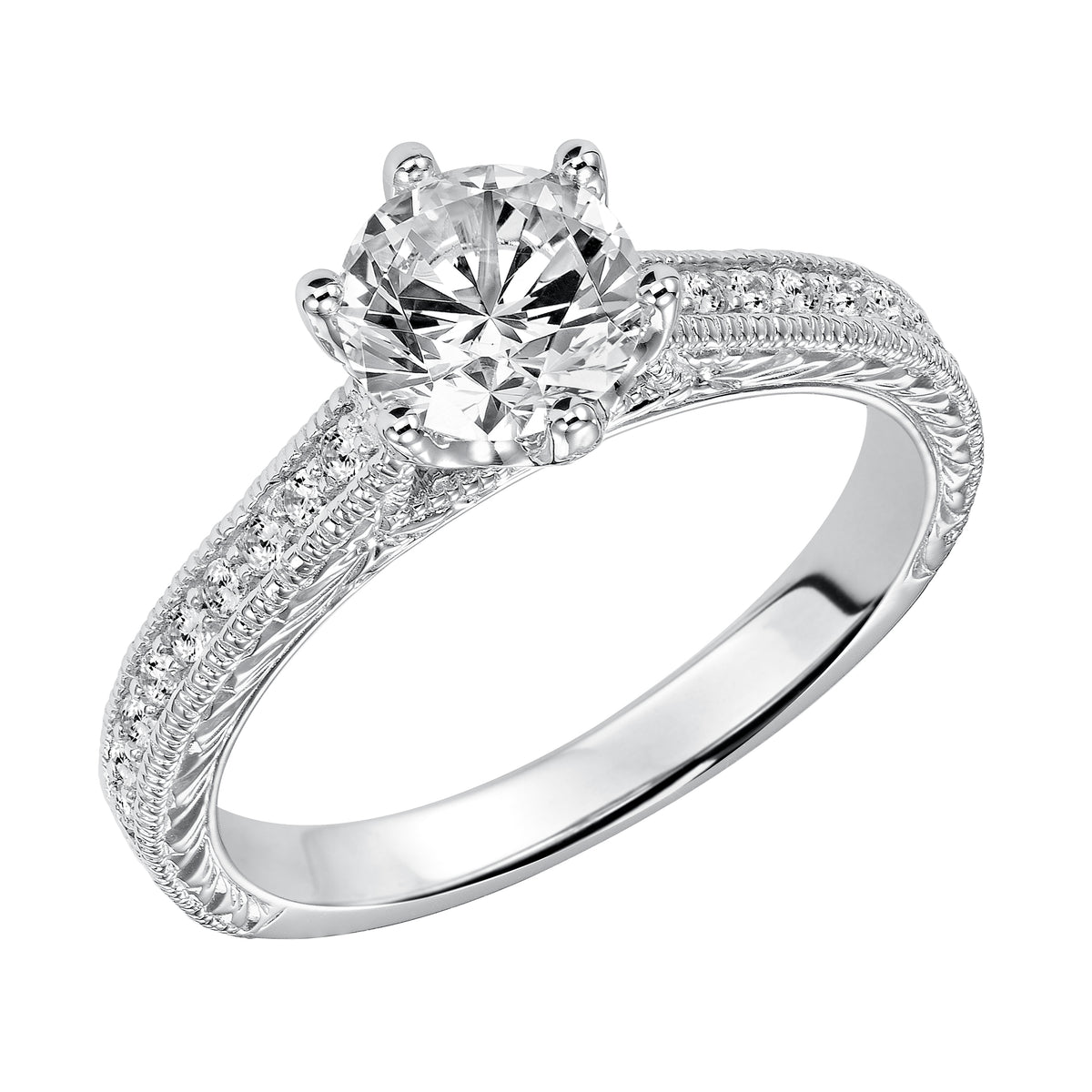 Accentuated with a six prong setting, this round diamond engagement ring features a magnificent diamond prong set engraved band with milgrain