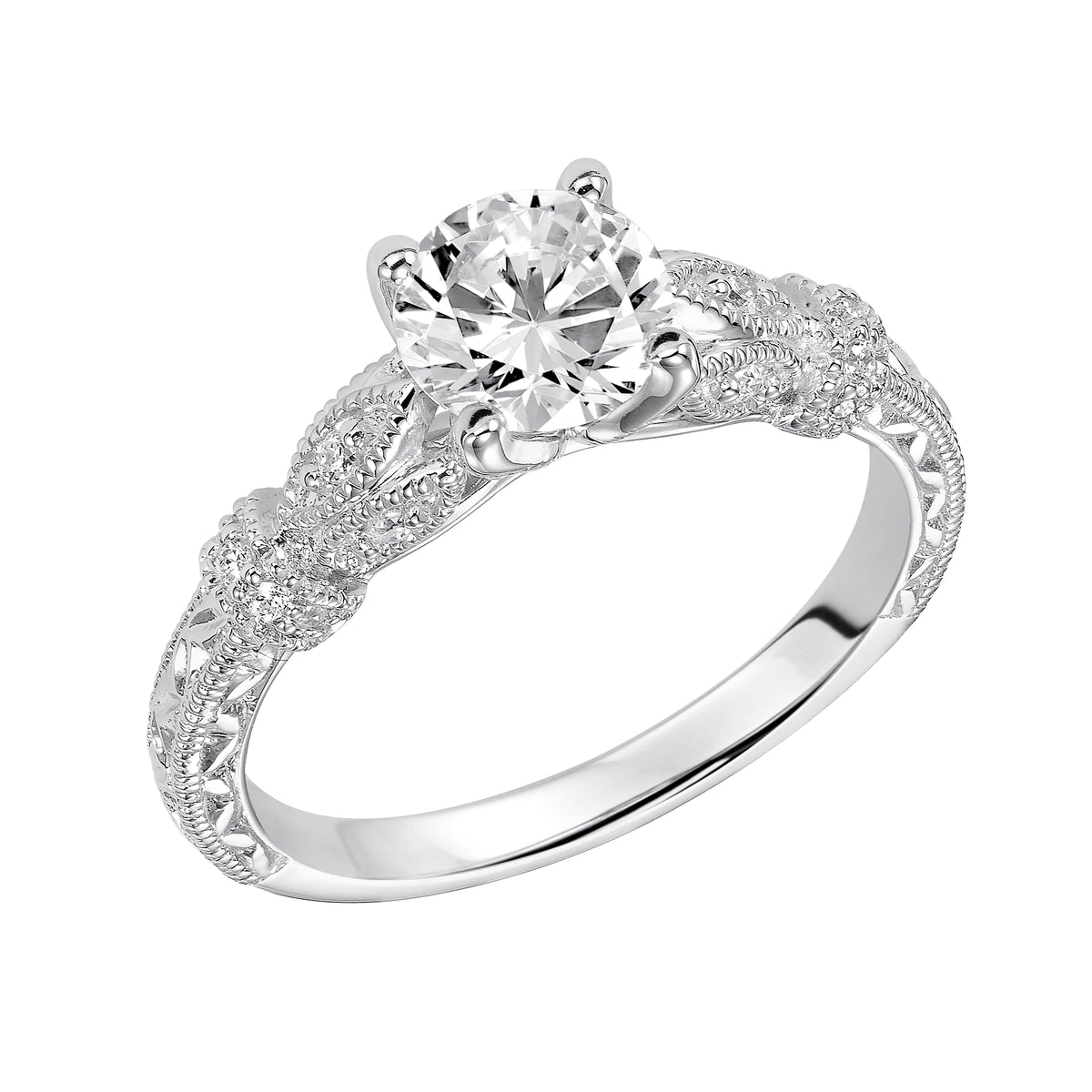 Featuring a round center diamond, this engraved and diamond prong set band with milgrain is absolutely breathtaking