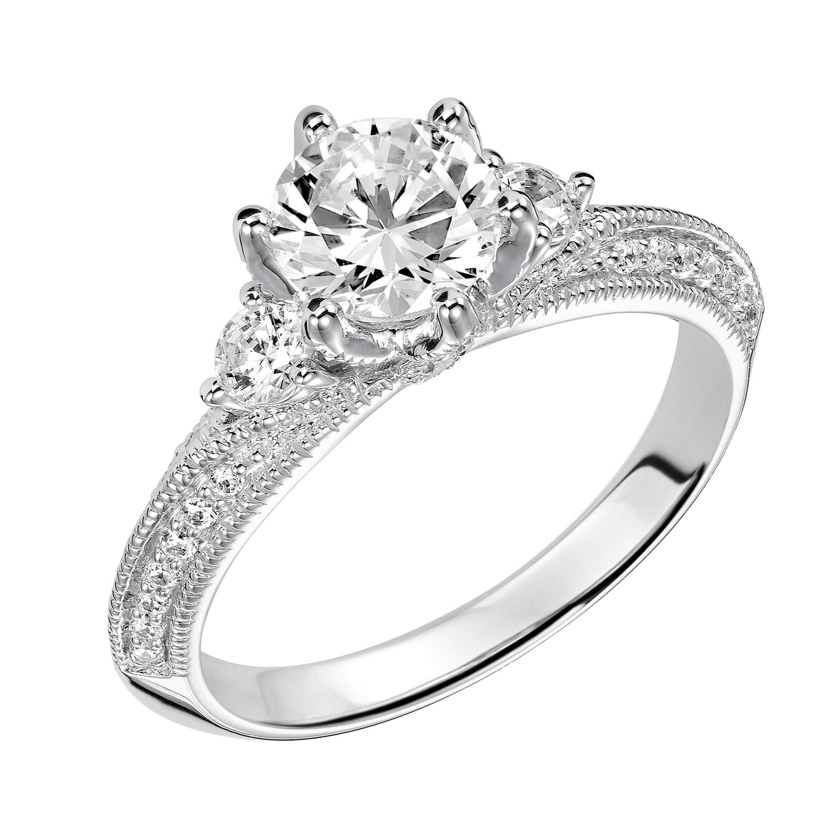 Set with six prongs, this round diamond engagement ring looks amazing with its prong set diamond band enhanced with milgrain