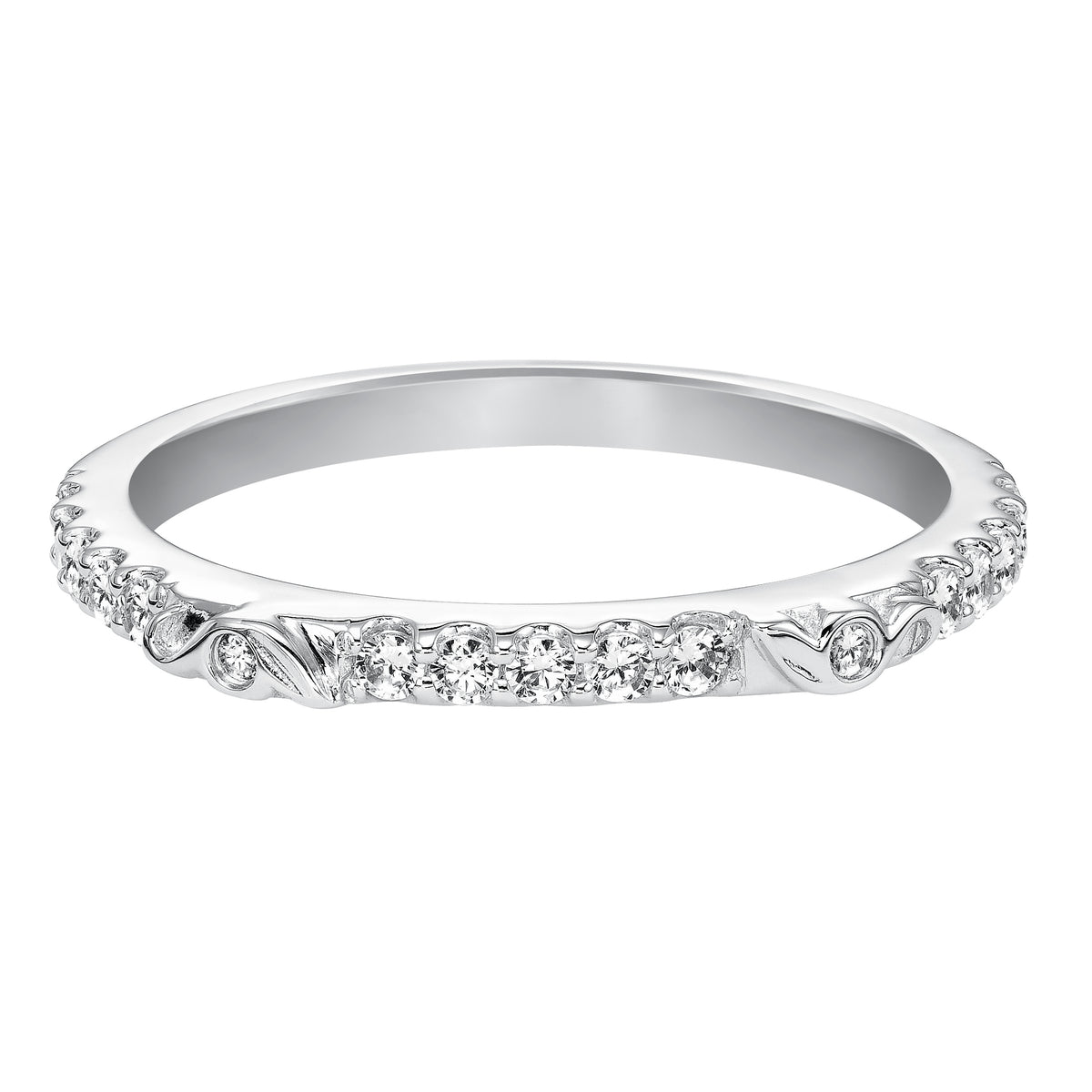 Wedding band with prong set, round diamonds and designed to fit flush with matching engagement ring.