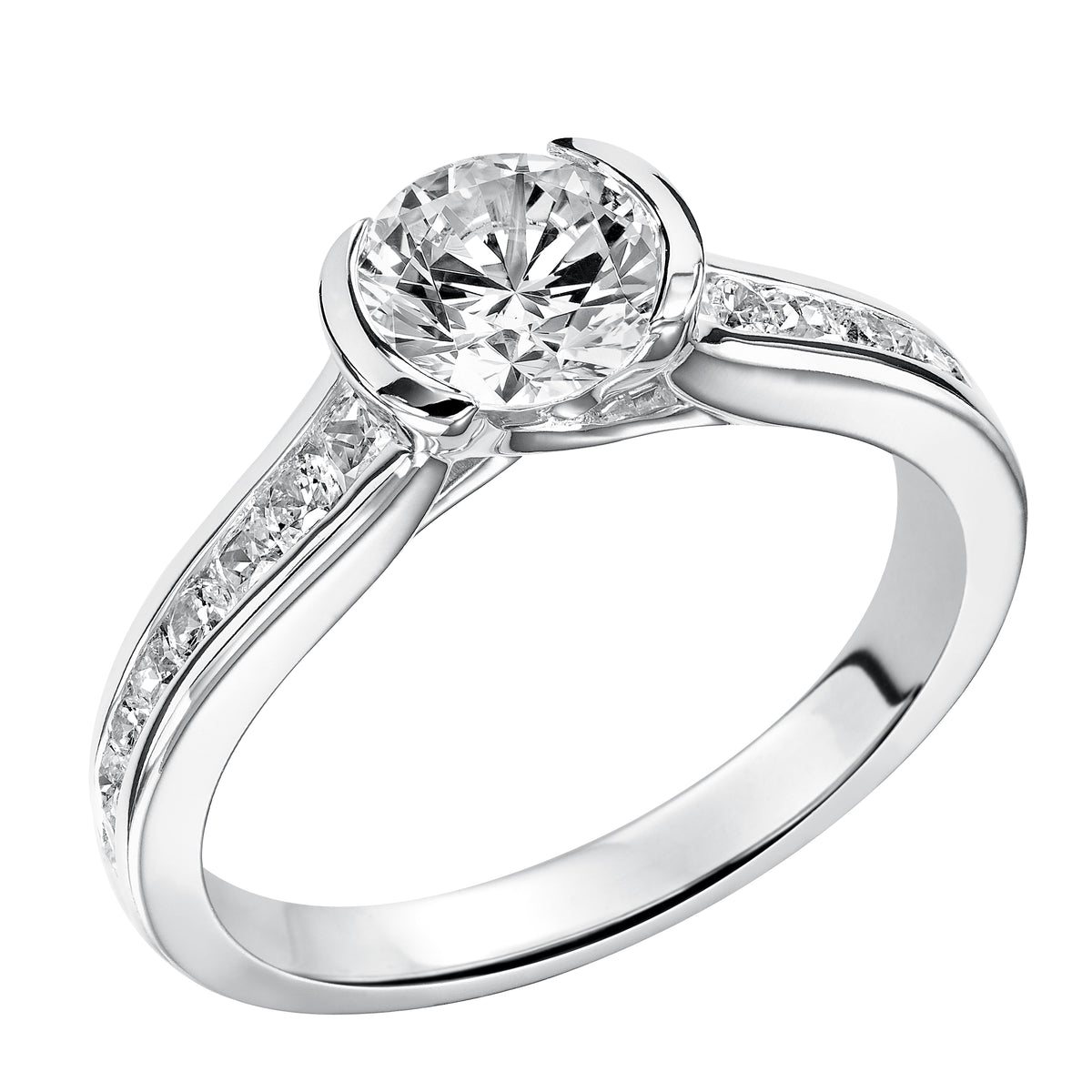 This stunning round bezel set diamond is perfectly paired with a channel set diamond band for a sophisticated, timeless look
