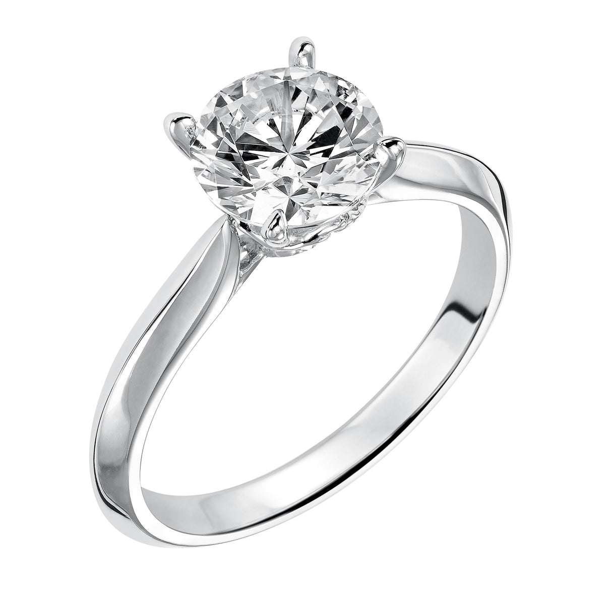 Sleek and sophisticated styling is infused into the design of this engagement ring with its streamlined knife-edged high polish band to accentuate the center stone