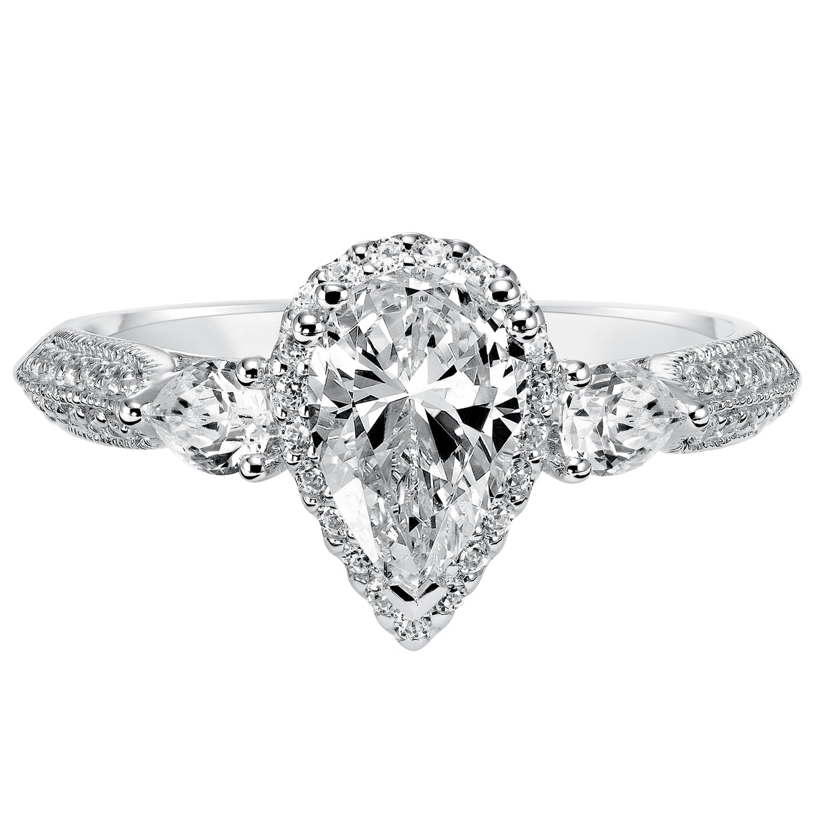 Old Hollywood glamour is infused into the design of this 3-stone pear cut diamond engagement ring with prong set diamonds and milgrain gracing the band
