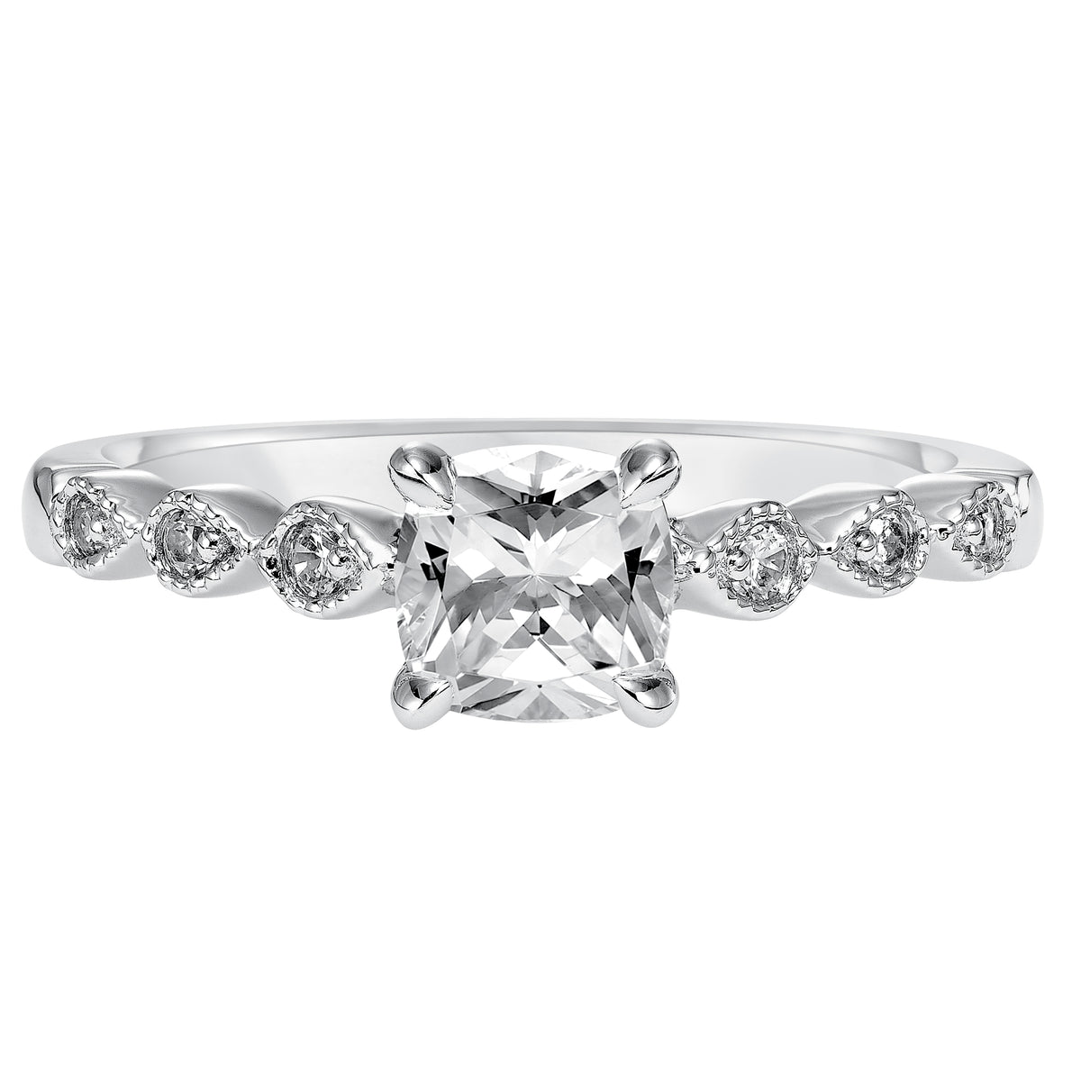 Dazzling with its intricately designed diamond band, this engagement ring is distinct yet enchanting