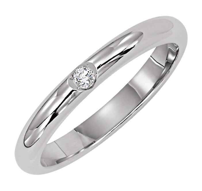 Wedding band with bezel set, round diamond and bright polished band.