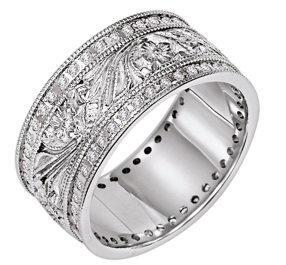 Wedding band with engraved design, milgrain and diamond accents.