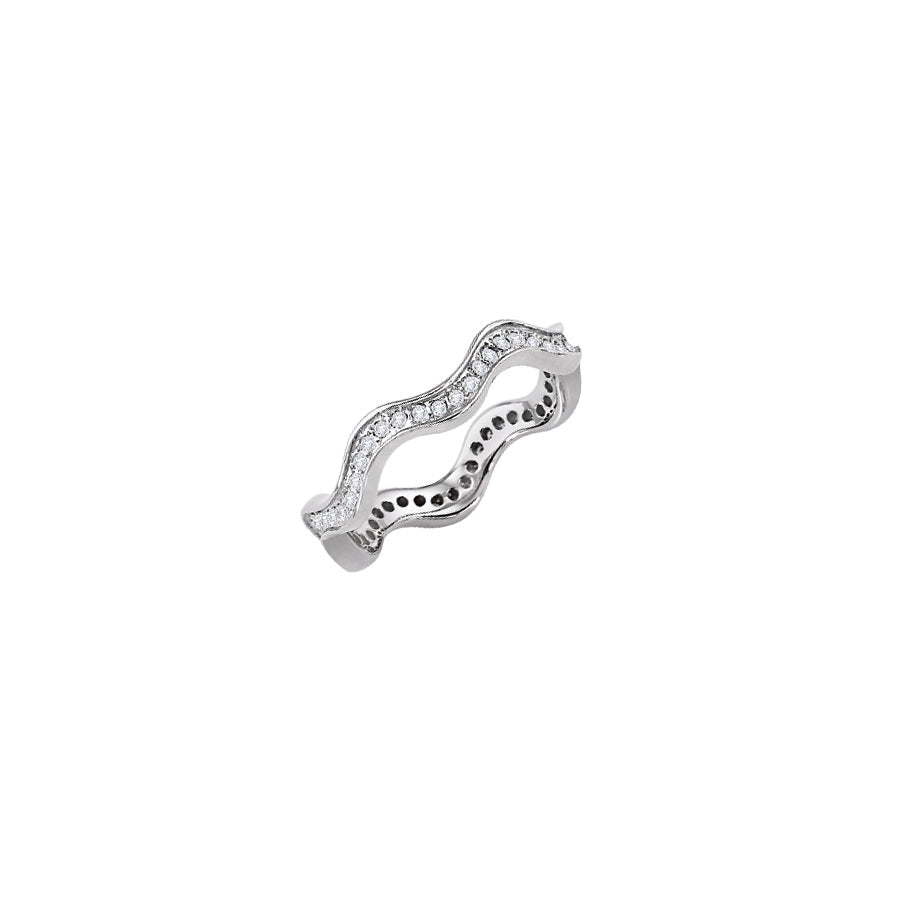 Eternity wedding band with round diamonds in a stackable wave design.